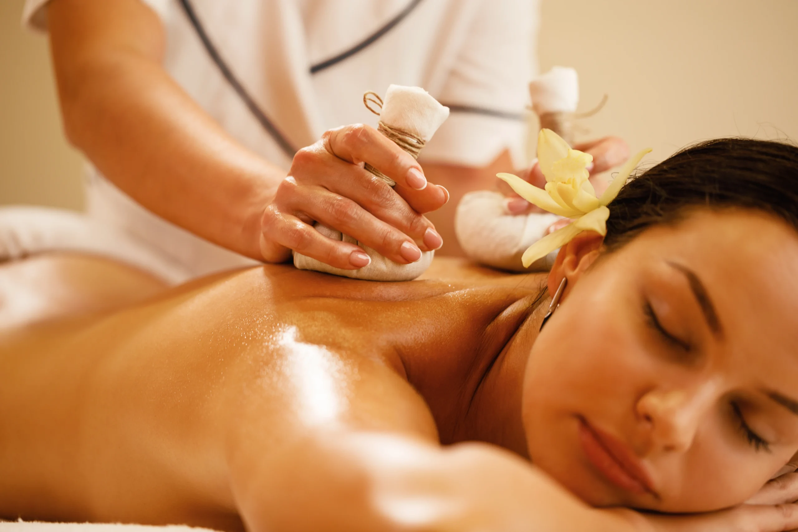closeup-relaxed-woman-getting-back-massage-with-herbal-balls-health-spa